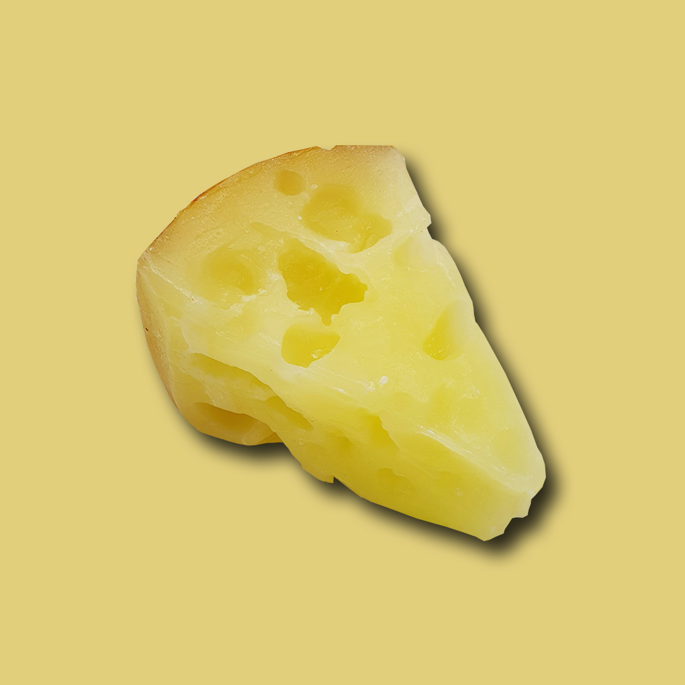 Kerze in Gruyere Käse Form von Cereria Introna im FROHSINN erhältlich